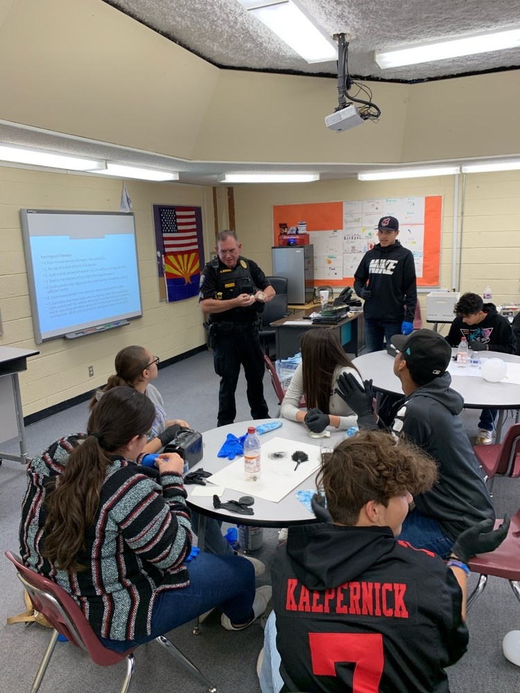 Hayden High School students in Law Enforcement class talking to police officers.